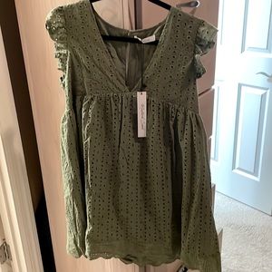Olive green romper that looks like dress. Pockets. Size medium